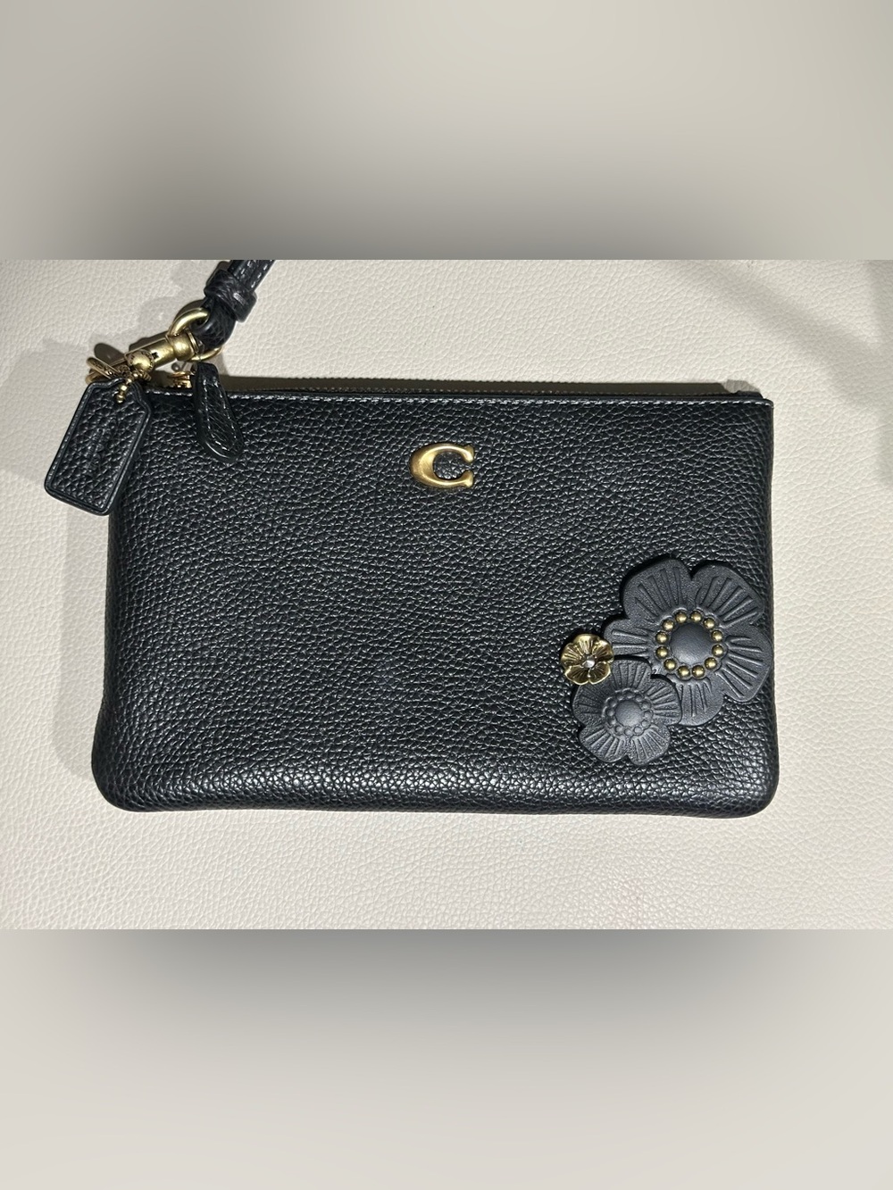 Coach Black Pebbled Leather Wristlet with tea roses